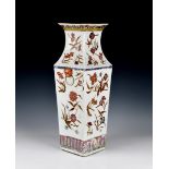 A Chinese porcelain famille rose square baluster vase, probably early 20th century, iron red four