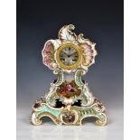 A French porcelain mantel clock, 19th century, the twin train movement with silk suspension and