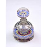 A 19th century Millefiori glass paperweight, of rounded tapering form, the base with six
