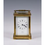 A mid to late 19th century brass carriage clock signed 'Dent, 61 Strand, London', the signed