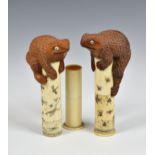 A matched pair of Japanese boxwood okimonos / scroll holders of toads, early 20th century, the large