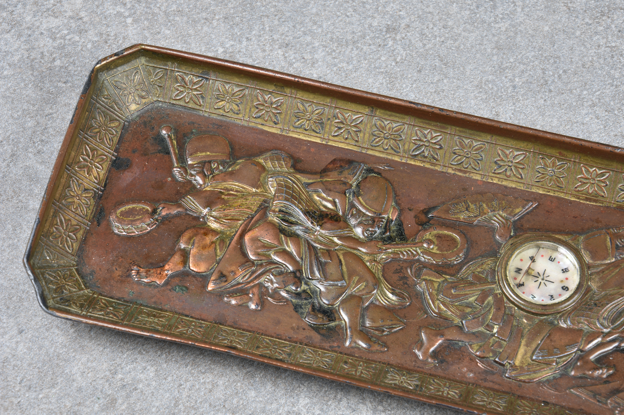 A Japanese metalwork Feng Shui tray with raised figures of minstrels, of rectangular form, centrally - Image 9 of 10