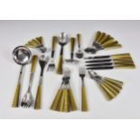 A collection of SABRE (France)18-10 stainless steel and acrylic flatware, the handles imitating