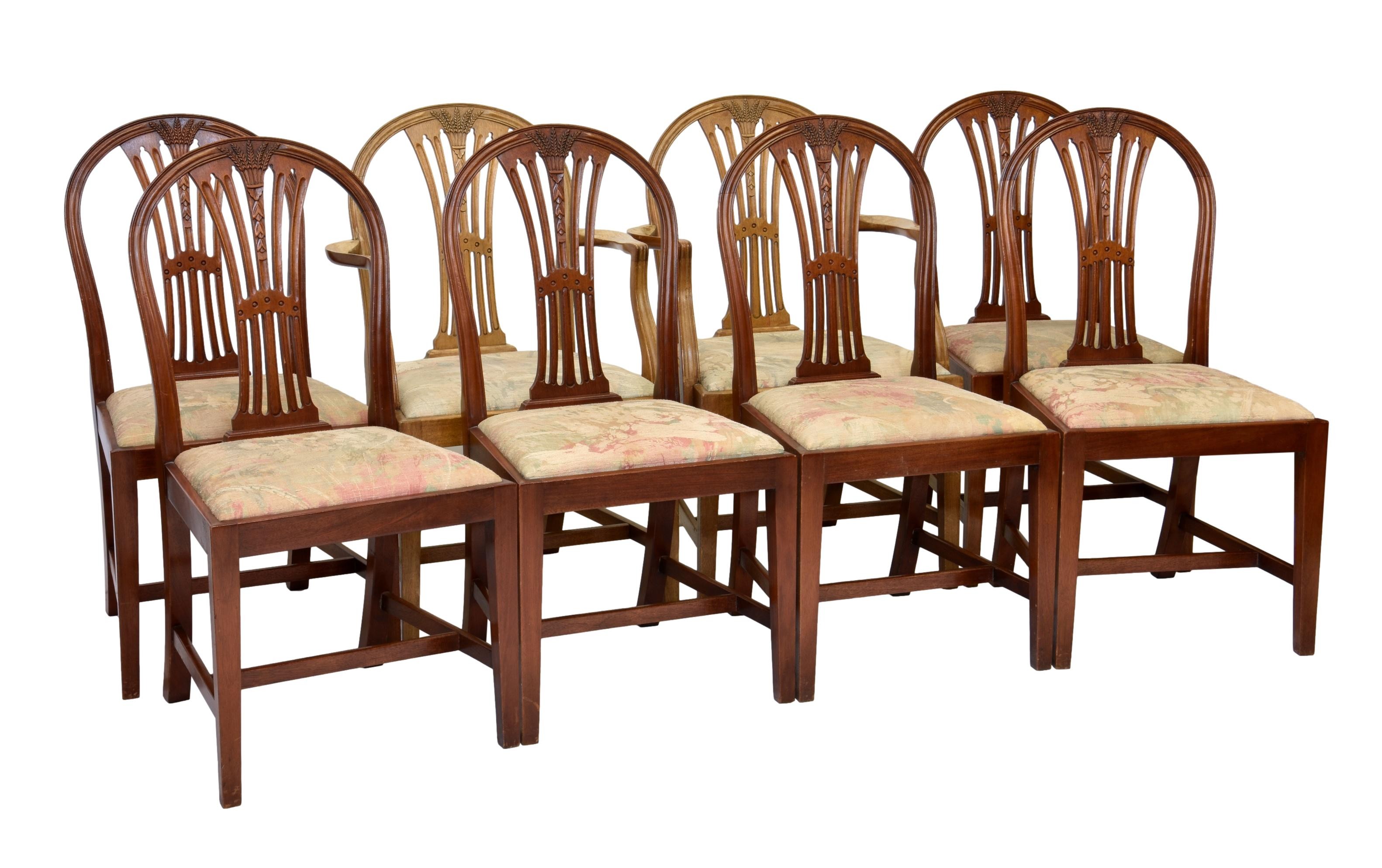 A set of eight George III style mahogany dining chairs, including a pair of carvers, the slightly