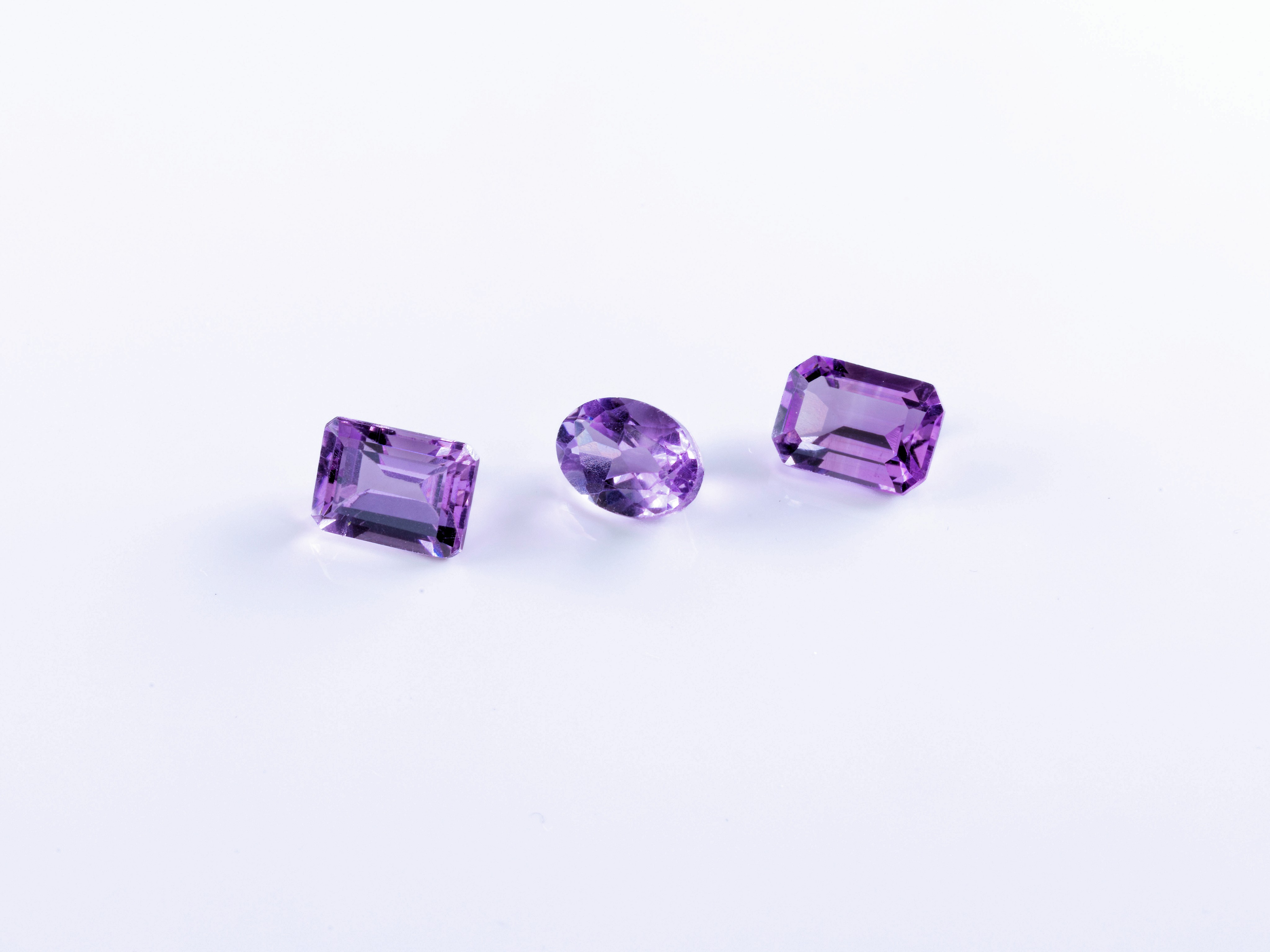 Four loose amethysts, of varying size and cuts, the largest measuring approx. 7.5mm in length. (4).