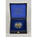 A Rothschild Bank 14ct gold commemorative medallion / coin, obverse; Arrows and ribbons, reverse; '