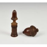 A 19th century coquilla nut nutmeg or spice grater, of acorn form, the rasp set in threaded horn