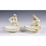 A pair of Royal Worcester figural sweetmeat dishes, modelled by James Hadley, after Kate