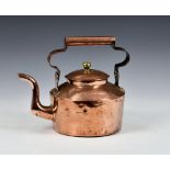 An antique copper kettle, having lift off lid with brass finial and heavy duty shaped loop handle,