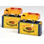 Two Matchbox Lesney 1-75 Series MB37a Karrier Bantam 'Coca-Cola' Lorries, one with uneven load,