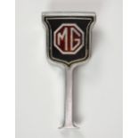 An Early to Mid 20th century Chrome ' MG ' Car Radiator Grill Badge, 7in. (17.8cm.) high. * Some