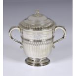 Polo interest - A George V silver presentation twin handled cup & cover, Pairpoint Brothers, London,