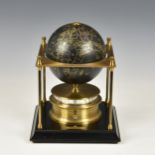 The Royal Geographical Society World Clock, 1980, the black and gilt terrestial globe above a