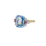 A mid-century aquamarine, ruby and diamond dress ring, set with an octagonal-cut aquamarine, between