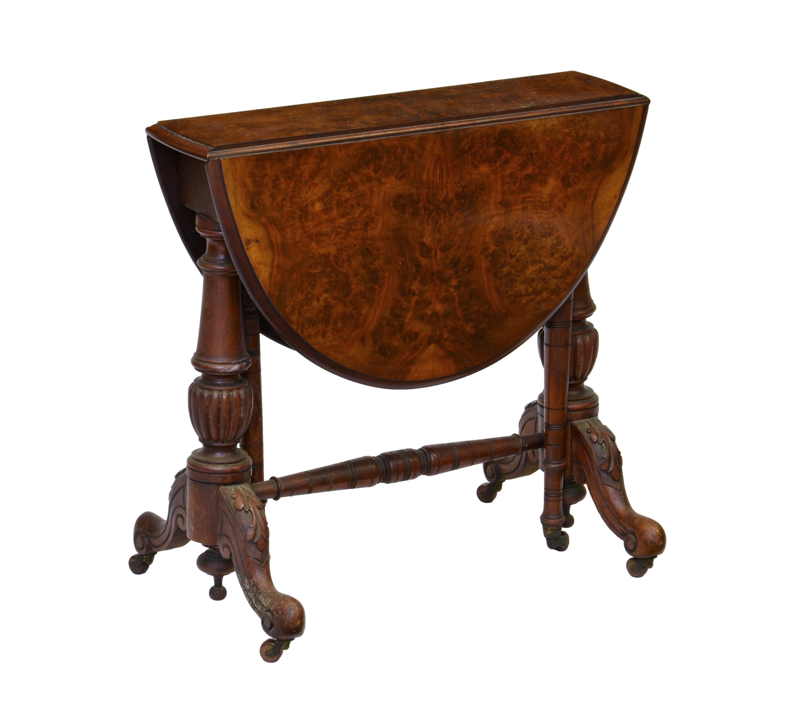 A small Victorian burr walnut oval Sutherland table, the moulded dropflap top opening on gatelegs,