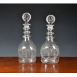 A pair of Georgian etched glass pint decanters, mallet form with triple neck rings and pontils,