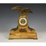 A late 19th century French Sienna marble and ormolu mounted mantel clock, the drum case surmounted