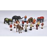 A collection of vintage hand painted lead circus figures, comprising of ring master, animal trainer,