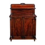 A fine late Regency mahogany collectors cabinet or chiffonier, the rectangular top with anthemion