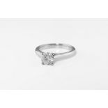 An 18ct white gold and diamond single-stone ring, set with a brilliant-cut diamond, diamond