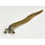 A 19th century novelty white metal and horn letter opener / paperknife fashioned as a lizard, 9 ¾in.