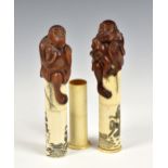 A matched pair of Japanese boxwood okimonos / scroll holders of monkeys, early 20th century, each