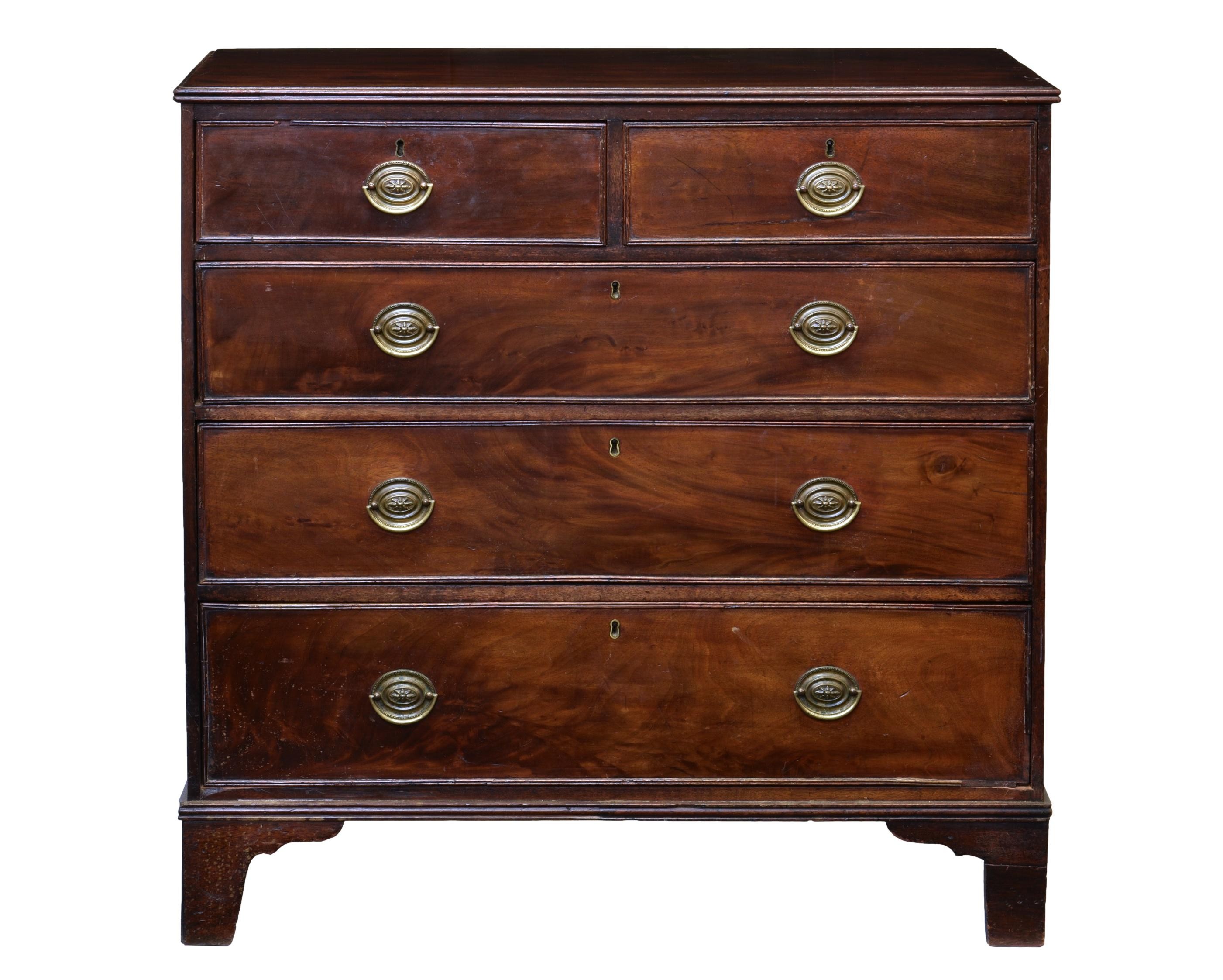 A George III mahogany straight front chest, the reed moulded top over two short and three long