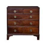 A George III mahogany straight front chest, the reed moulded top over two short and three long