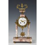 A French marble and gilt portico clock, early 20th century, signed by Jersey retailer to dial,