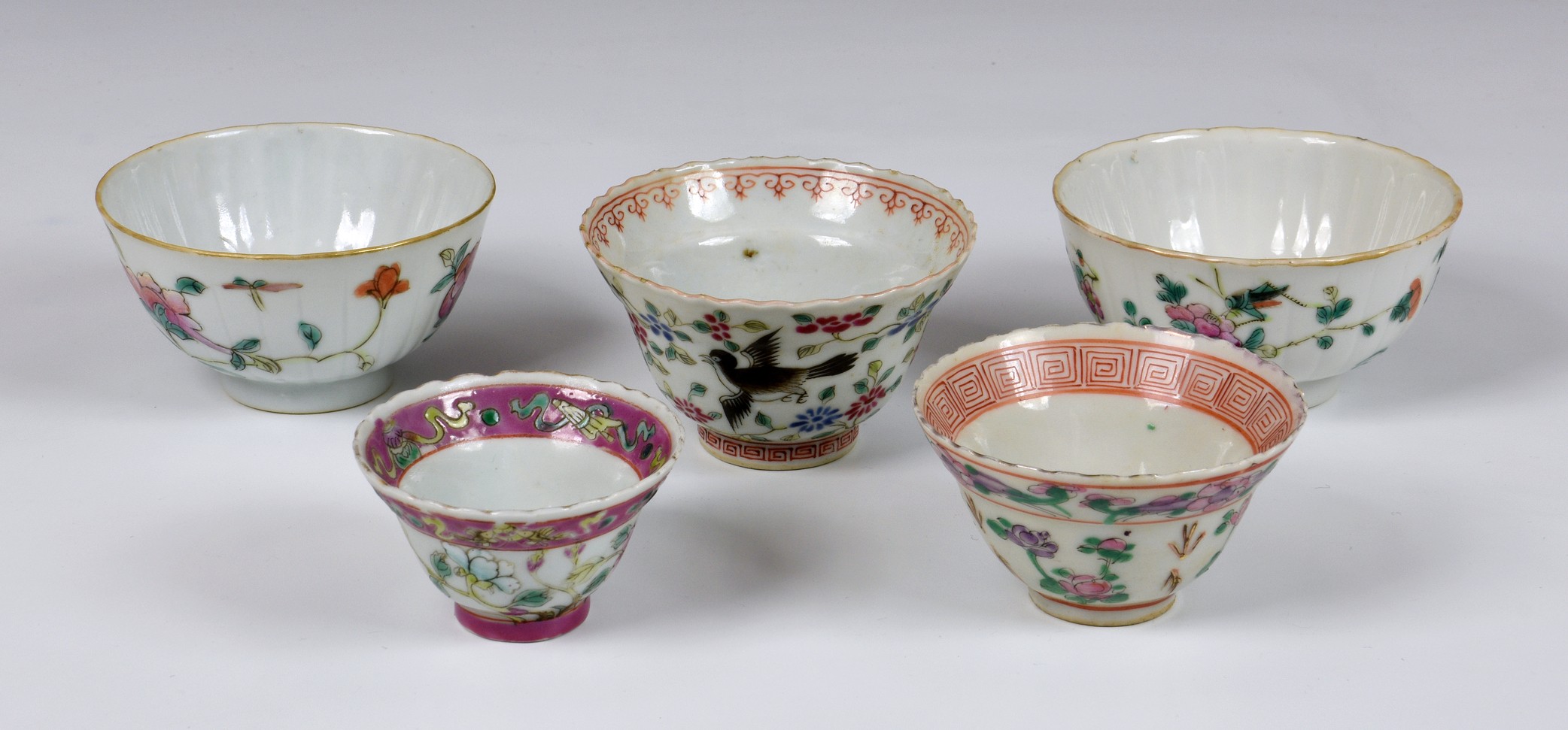 Five Chinese famille rose small bowls, 19th / early 20th century, including a matched pair of