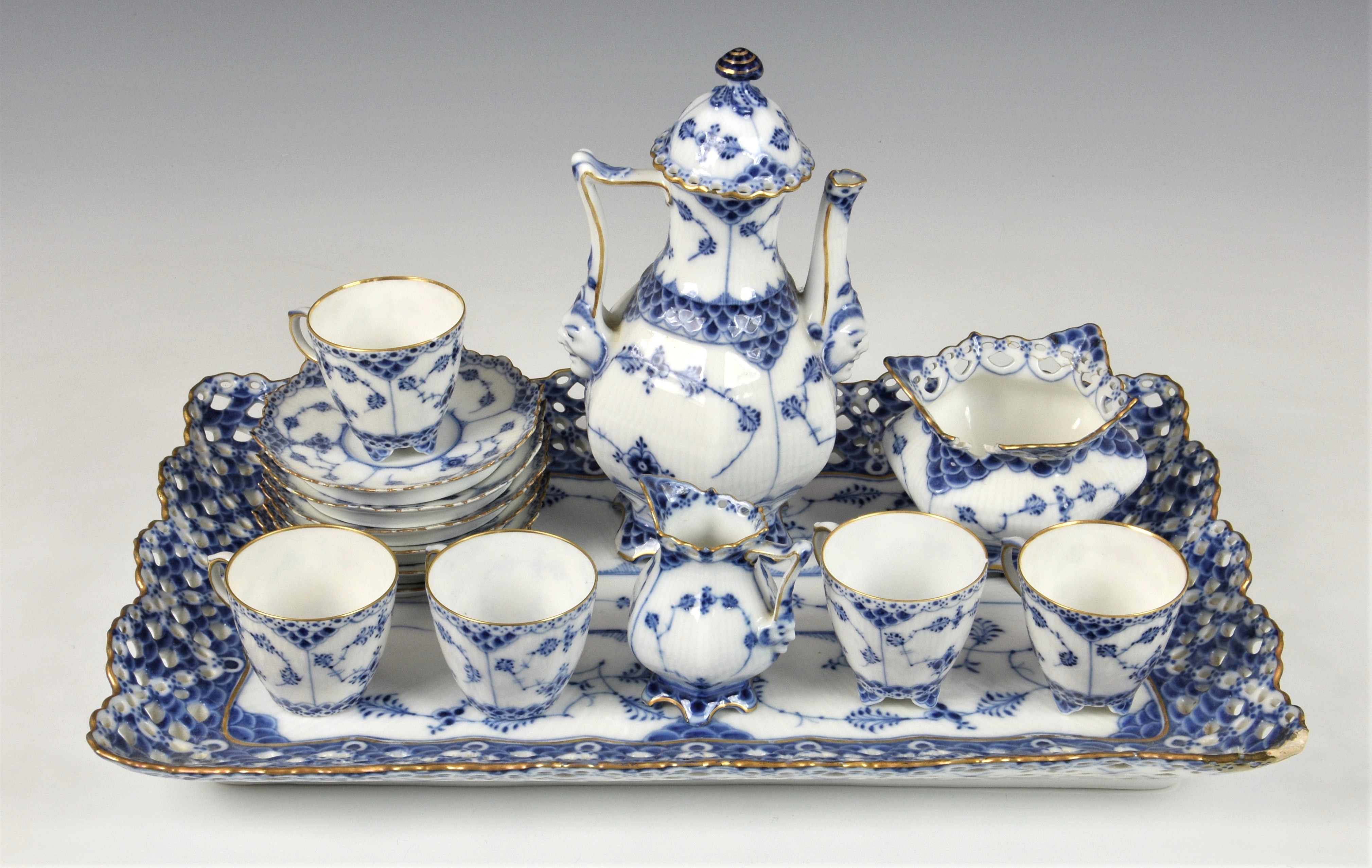 A Royal Copenhagen cabaret set in Blue Full Face pattern, each piece enriched with blue and white
