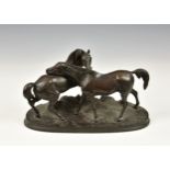After Pierre-Jules Mêne (France, 1810-1879), a patinated bronze equestrian group 'L' Accolade' (
