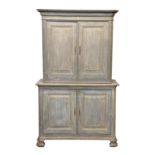 A 19th century French painted oak dresser, the flared, moulded cornice over a pair of panelled doors