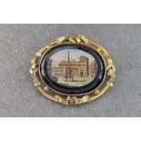 A Victorian rolled gold and micro mosaic brooch, the oval micro mosaic depicting a classical