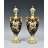 A pair of Coalport bone china topographical covered vases, early 20th century, each of baluster form