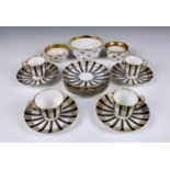 A small collection of Staffordshire Davenport cups & saucers, of slightly fluted design, in royal