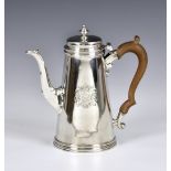 A fine George II silver coffee pot, Aymé Videau, London, 1736, of tapering cylindrical form upon a