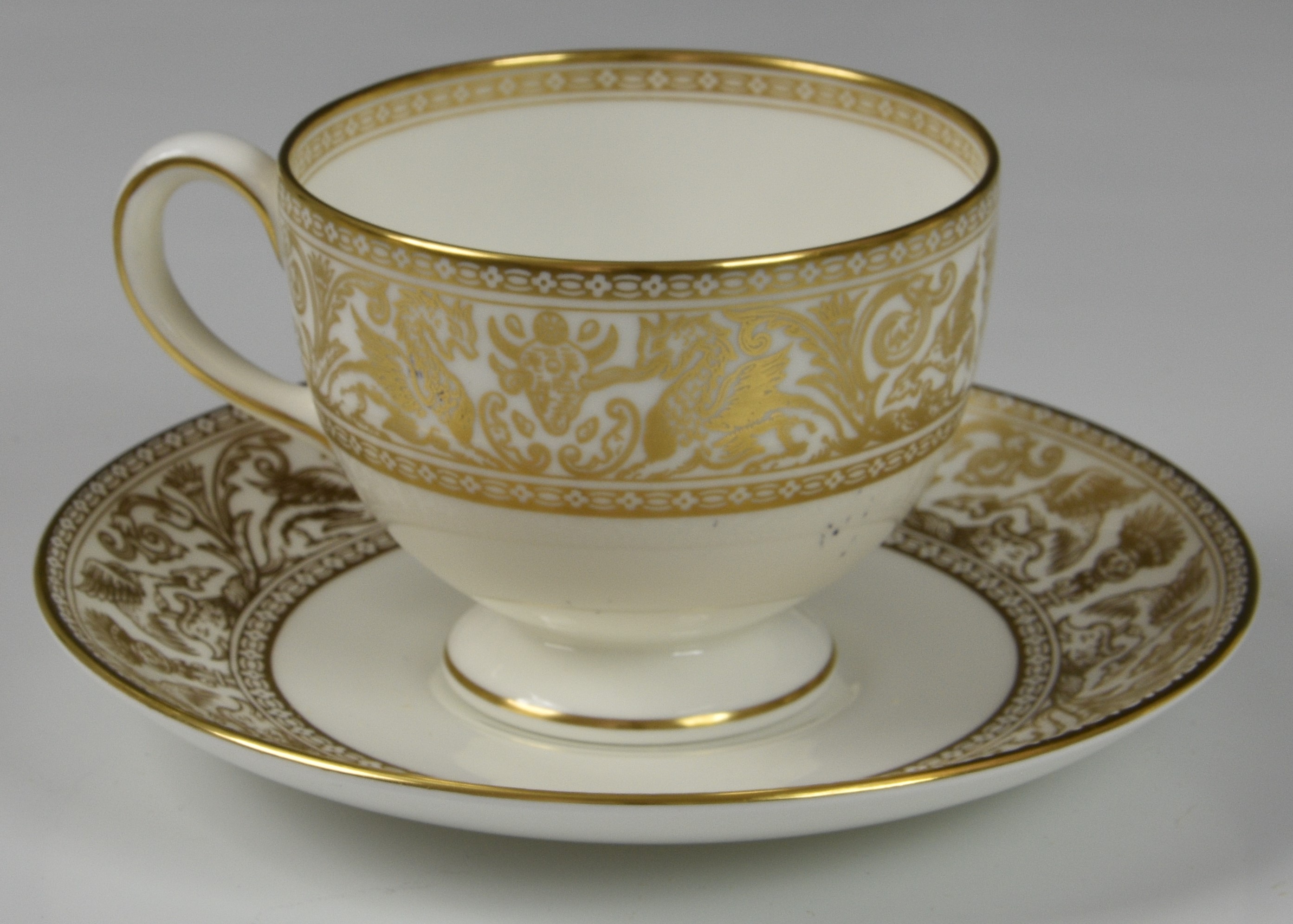 A Wedgwood China 'Gold Florentine' pattern tea service, comprising of teapot, six cups & saucers, - Image 5 of 6