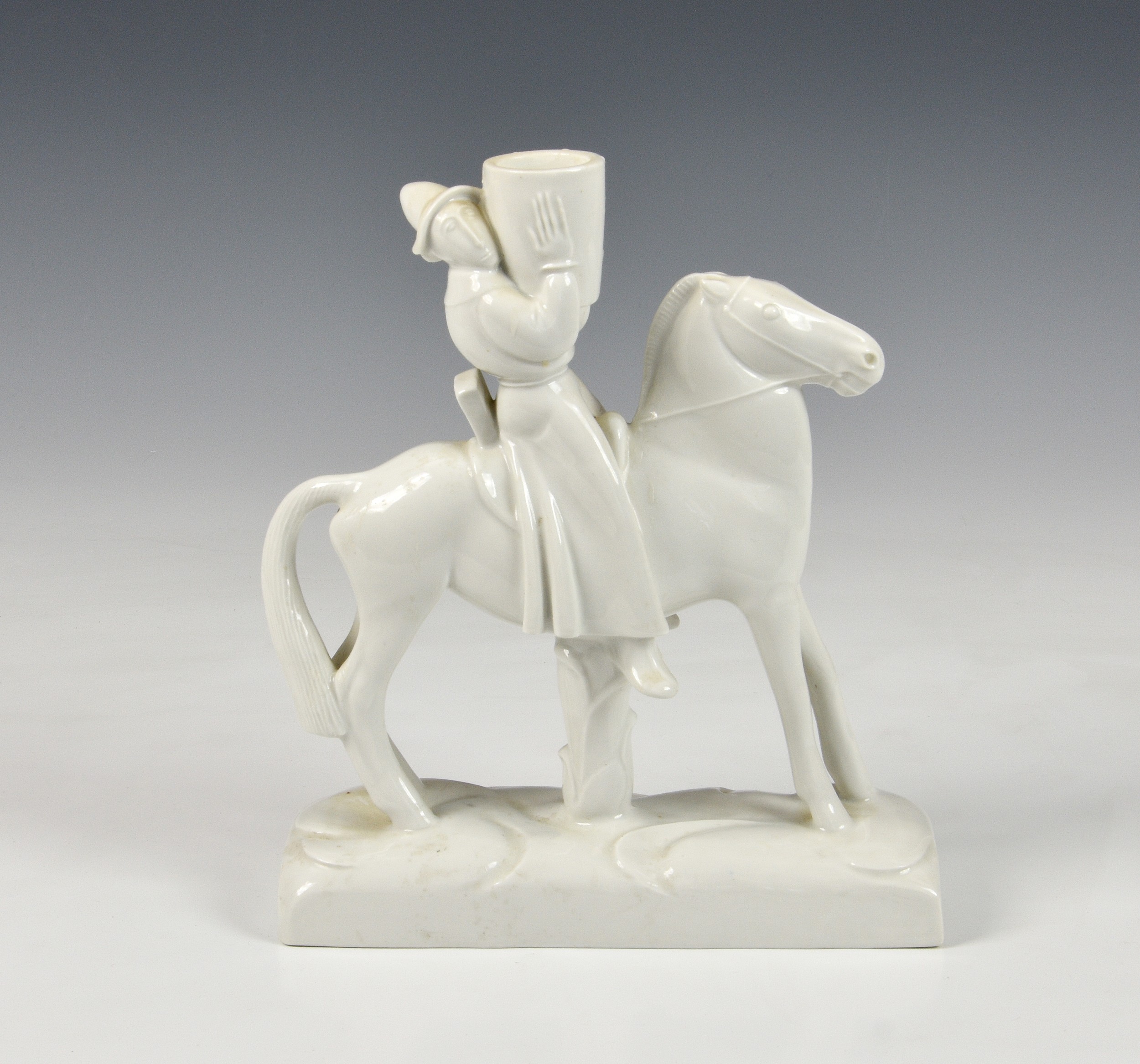 A Meissen white glazed Oriental figure on horseback, 20th century, underglaze blue crossed sword