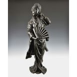 A large patinated bronze Japanese Bijin girl figure, wearing traditional dress holding a fan, six-