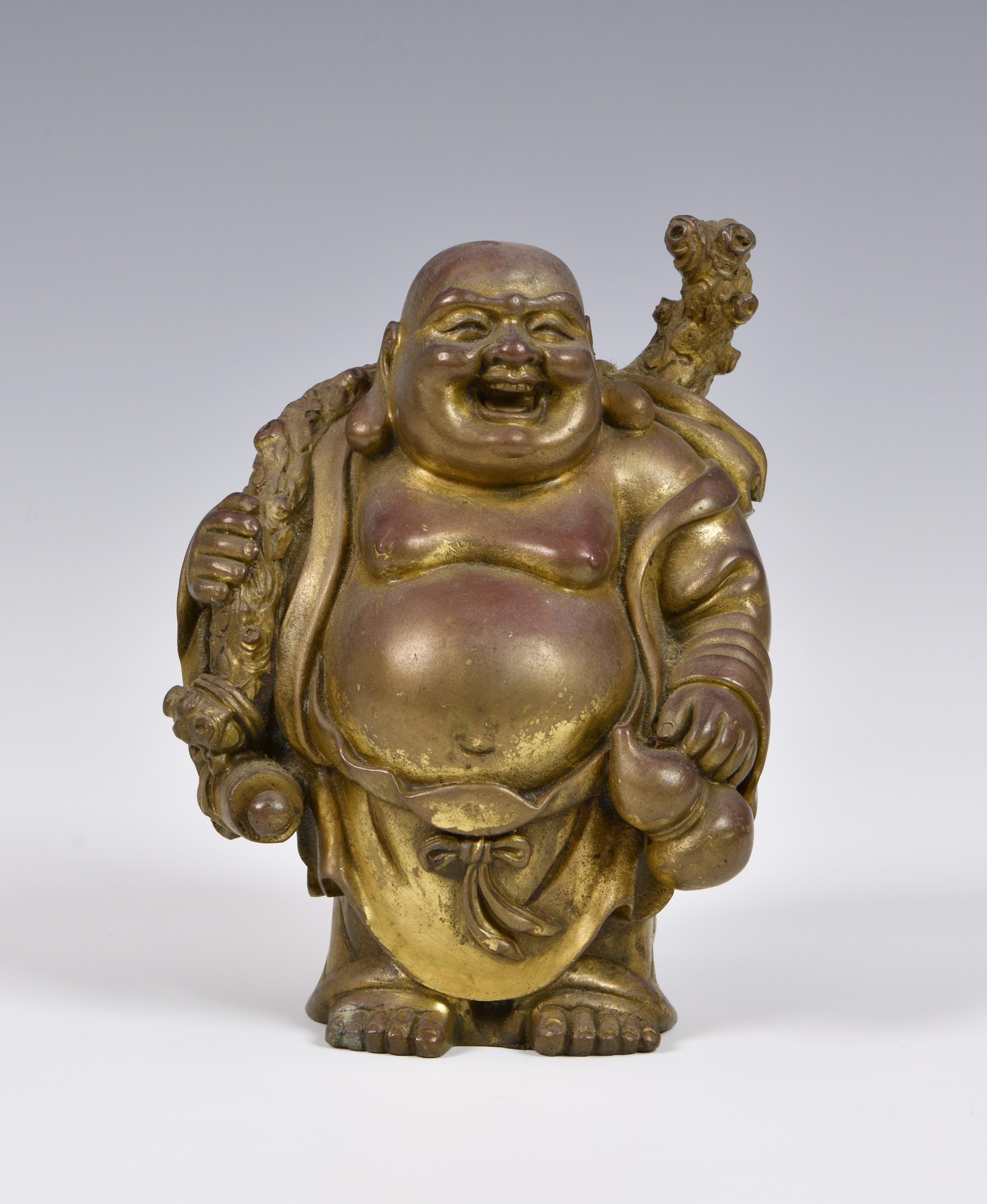A Chinese gilt bronze buddha figure, probably early 20th century, modelled in standing position,