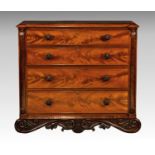 A good William IV mahogany four drawer chest, the moulded top with outset front corners on turned