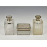 A pair of French wheel engraved and silver mounted square glass flasks, together with matching