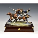 A Michael Sutty limited edition porcelain military group "The Charge of the Light Brigade", faults