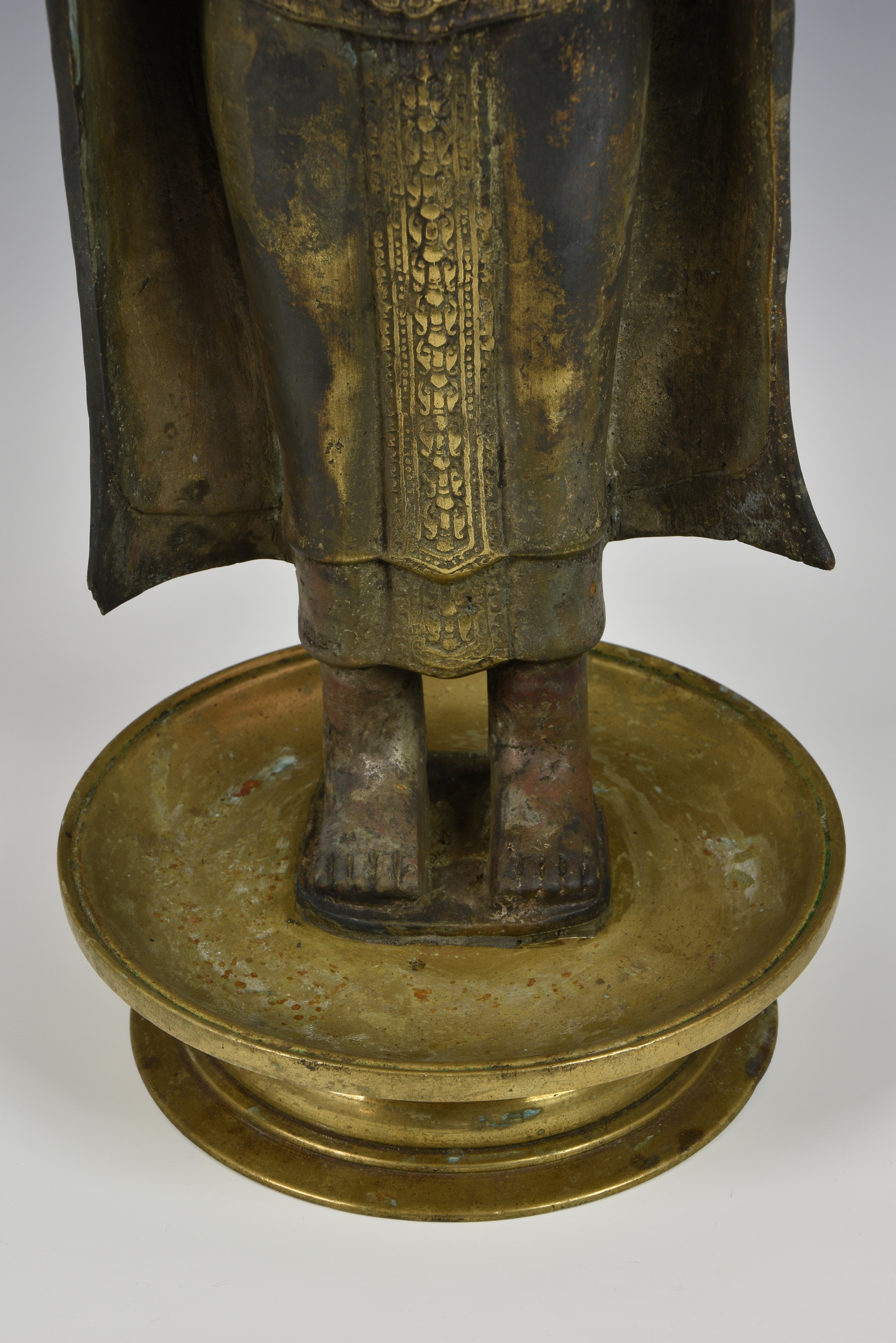 A gilt and black-lacquered figure of Buddha Shakyamuni, Thailand, cast metal Buddha, standing in - Image 4 of 9