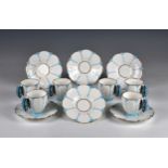 A set of six Aynsley Art Deco blue butterfly coffee cups and saucers, pattern no. B1322, the cups