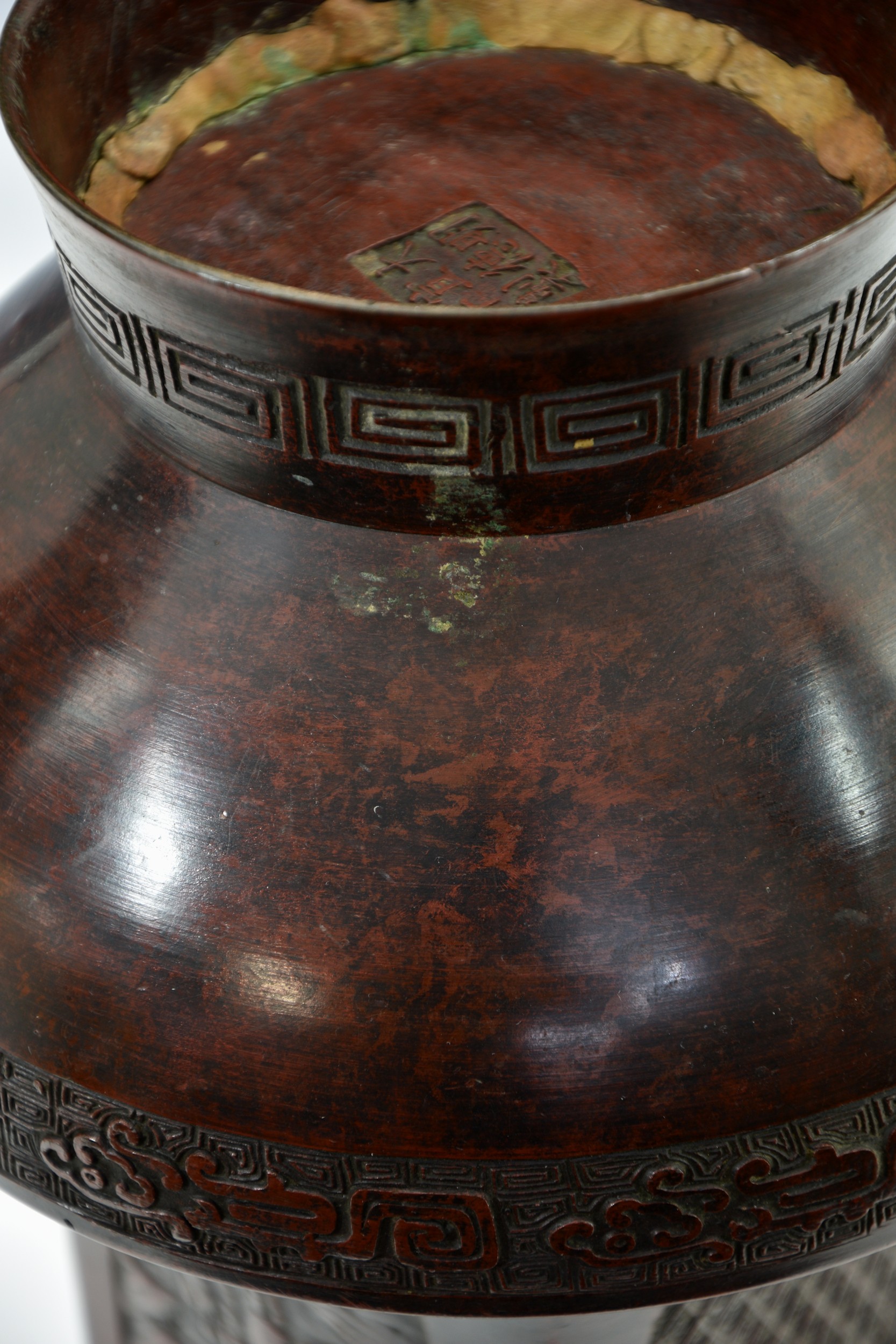 A Chinese patinated bronze two handled hu vase, probably 18th/19th century, with apocryphal Xuande - Image 6 of 6