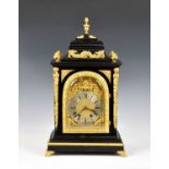 A 19th century ebonised and gilt metal mantel clock, the twin train movement numbered 4581, striking