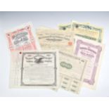 A small collection of late 19th and early 20th century share and bond certificates, including a