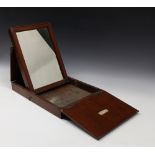 A 19th century mahogany cased campaign mirror, opening to reveal rectangular mirror plate, on an